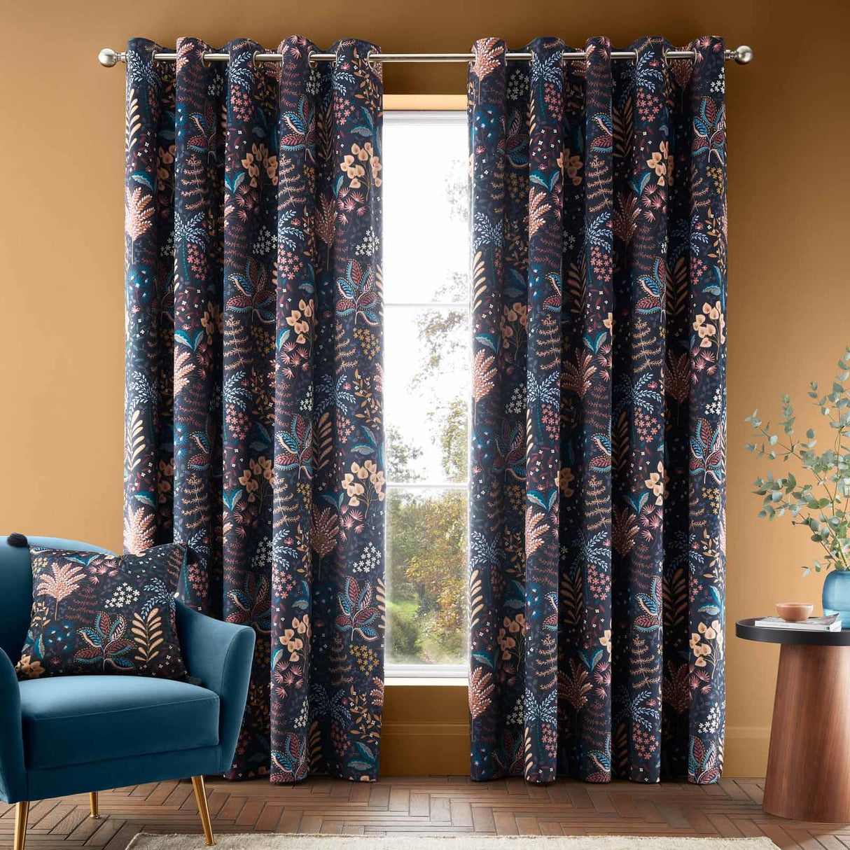 Exotic Leaves Eyelet Curtains by Catherine Lansfield