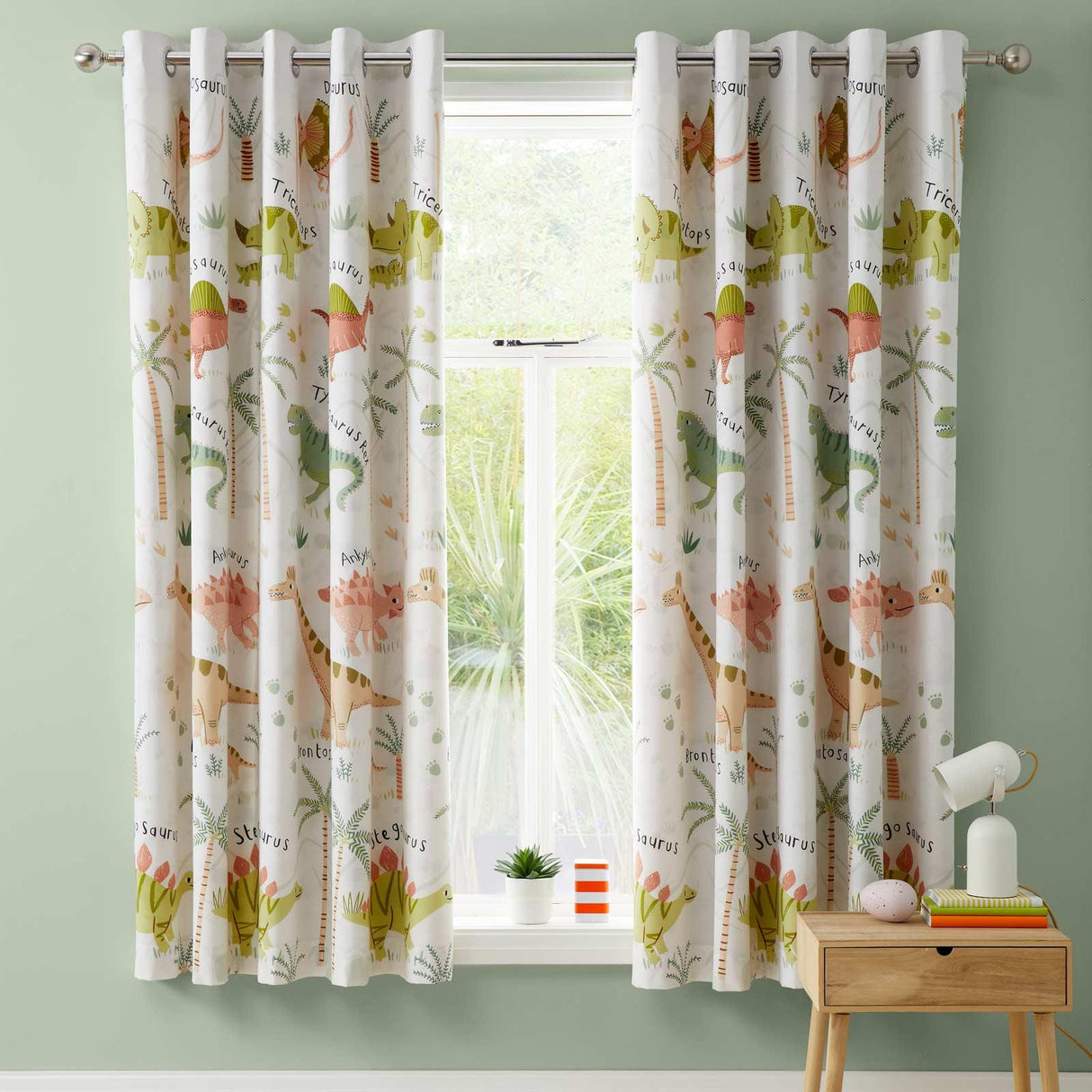Sleepy Dino Eyelet Curtains by Catherine Lansfield