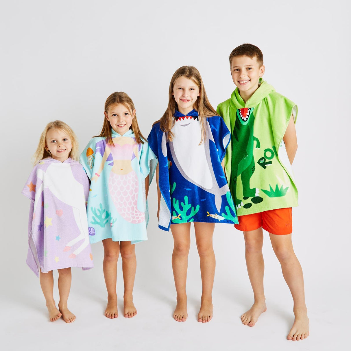 Dinosaur Kids Hooded Towel Poncho by Catherine Lansfield
