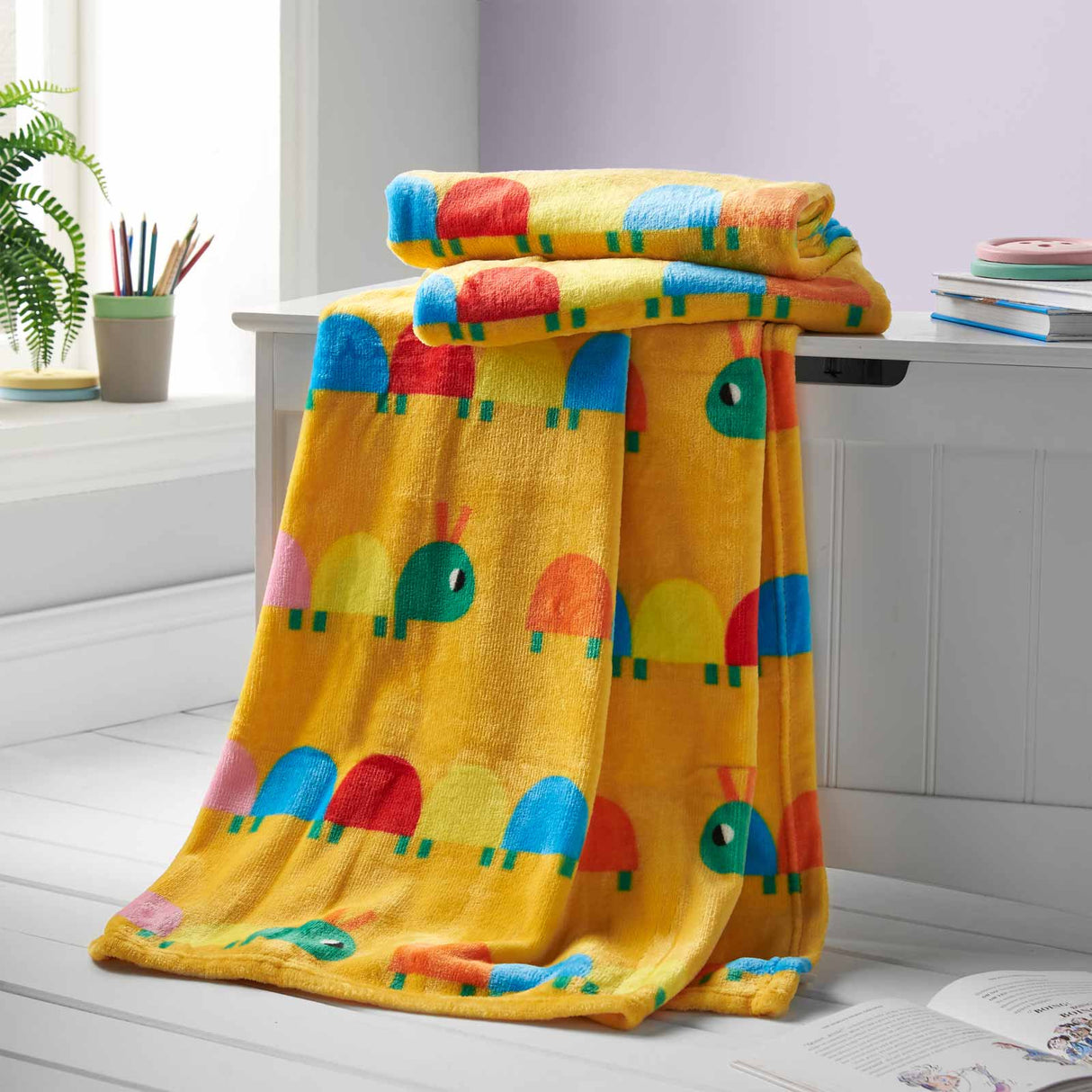 Curious Caterpillar Fleece Throw by Catherine Lansfield