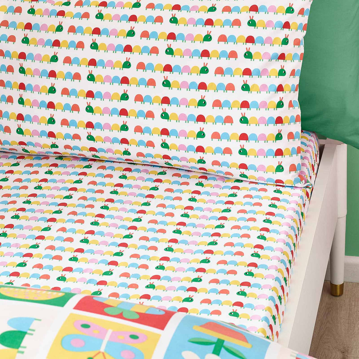 Curious Caterpillar Fitted Sheet by Catherine Lansfield