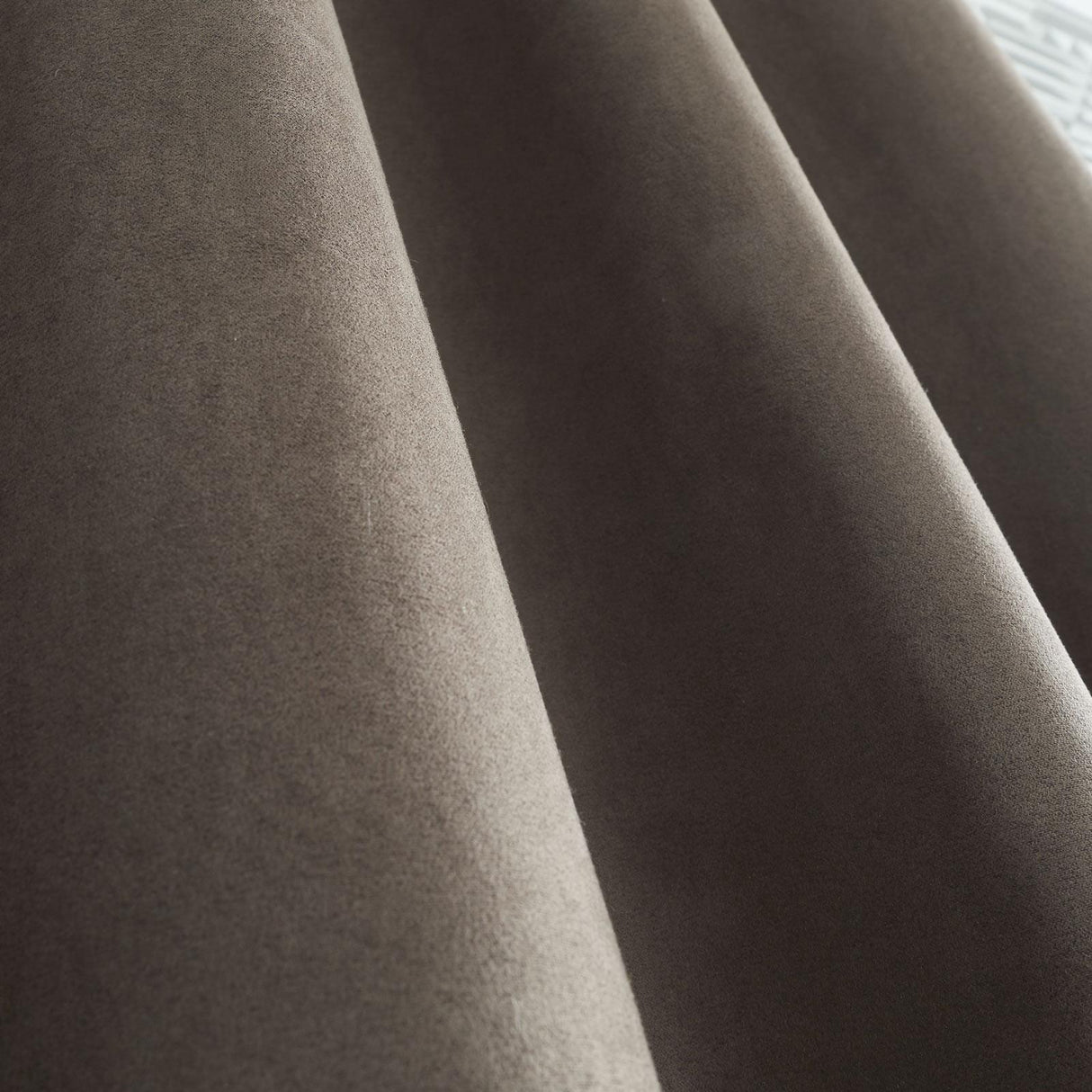 Faux Suede Eyelet Curtains by Catherine Lansfield