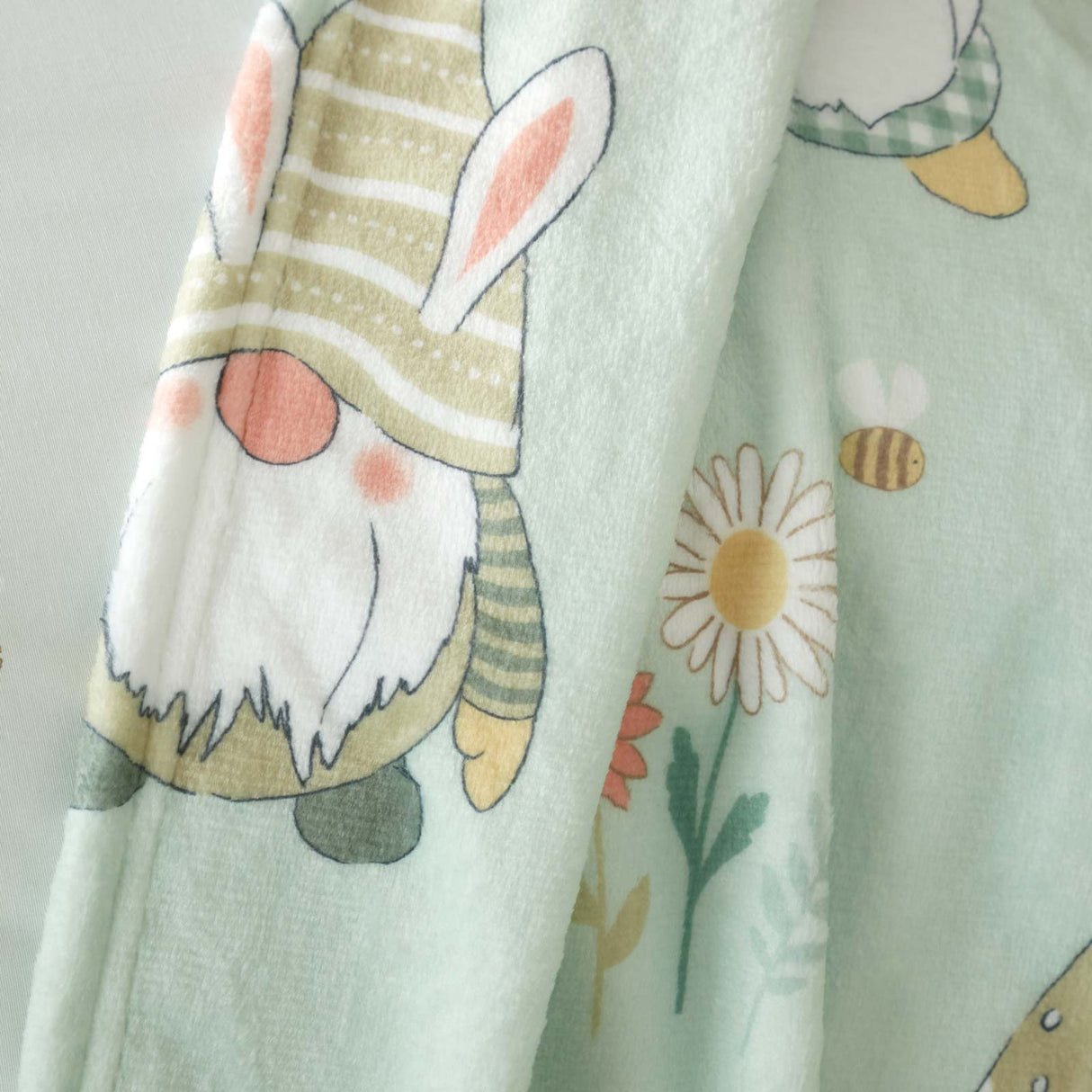 Spring Gonks Fleece Throw by Catherine Lansfield