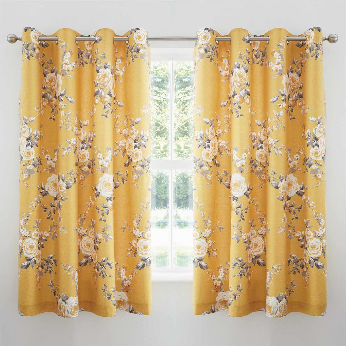 Canterbury Floral Eyelet Curtains by Catherine Lansfield