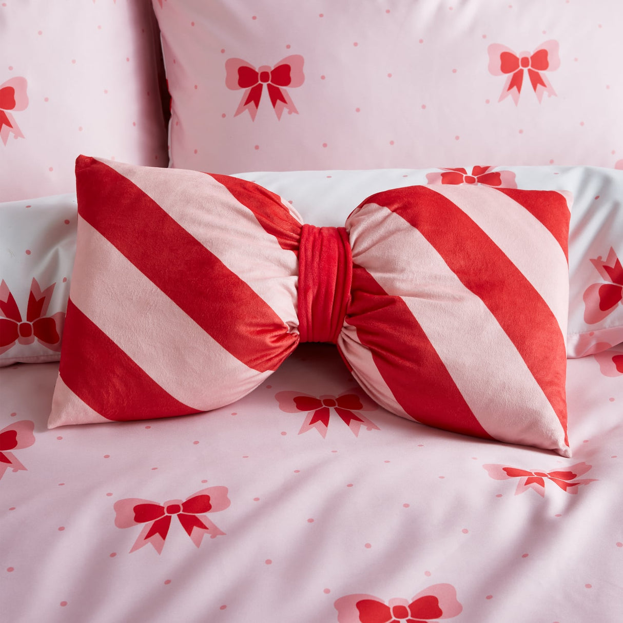 Sassy B Candy Stripe Bow 3D Filled Cushion - Dotty Bows Cushion Pink