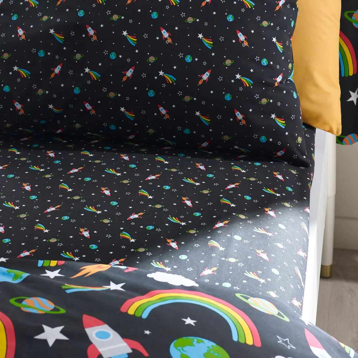 Rainbow Rockets Fitted Sheet by Catherine Lansfield