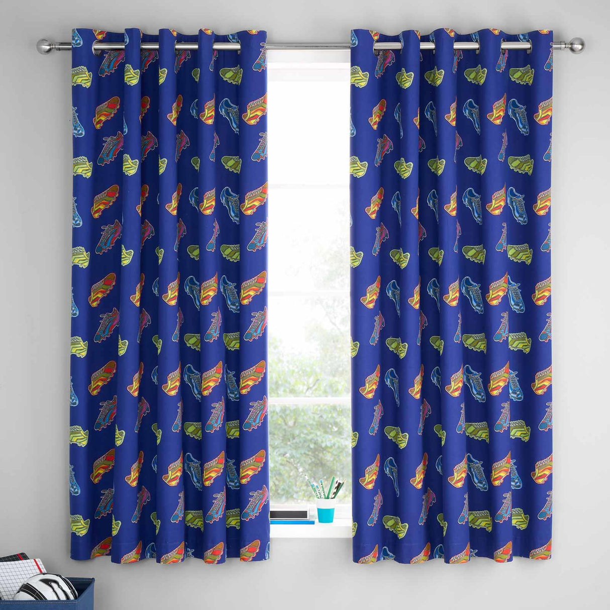 Bright Football Reversible Eyelet Curtains by Catherine Lansfield