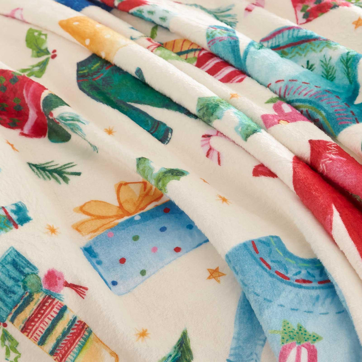 Christmas Jolly Jumpers Throw by Catherine Lansfield