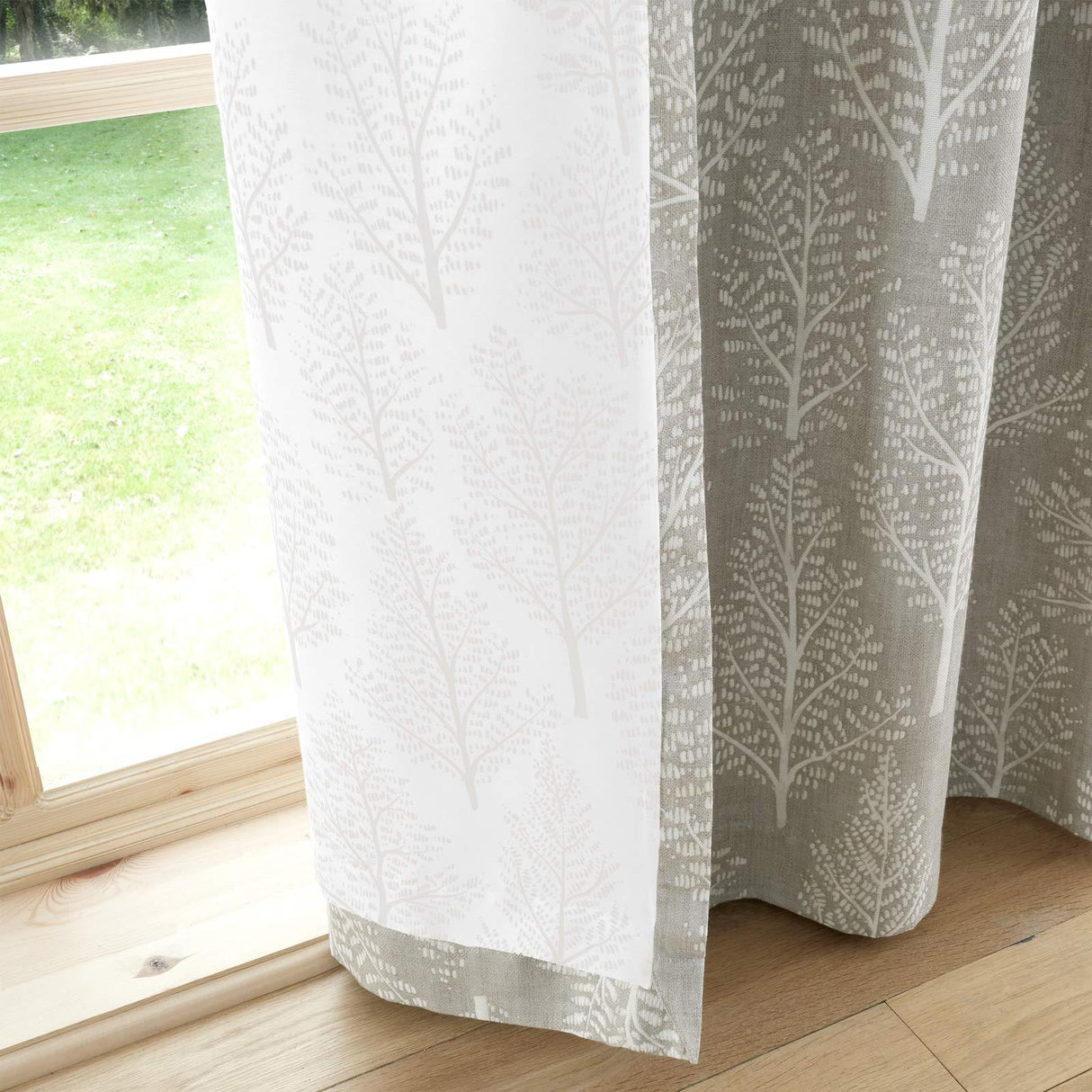 Alder Trees Eyelet Curtains by Catherine Lansfield