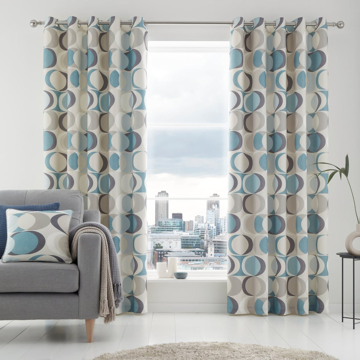 Sander Lined Eyelet Curtains - Duck Egg Light Filtering Printed