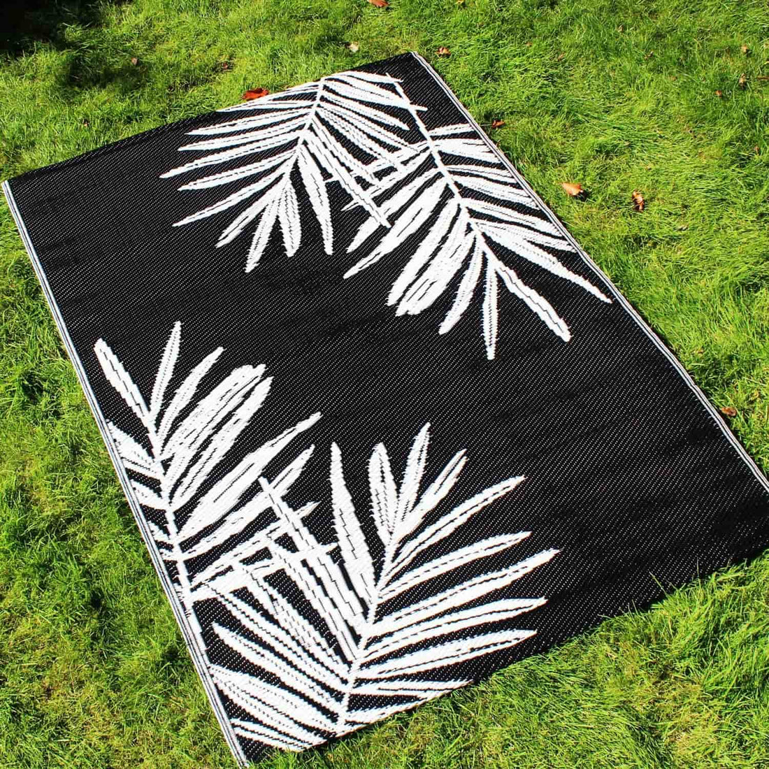 Tahiti Black Leaf Print Outdoor Rug 120cm x 170cm