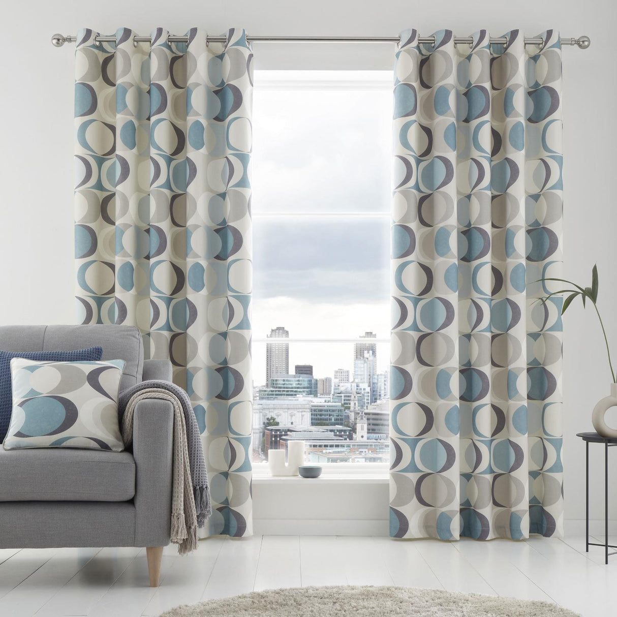 Sander Lined Eyelet Curtains by Fusion