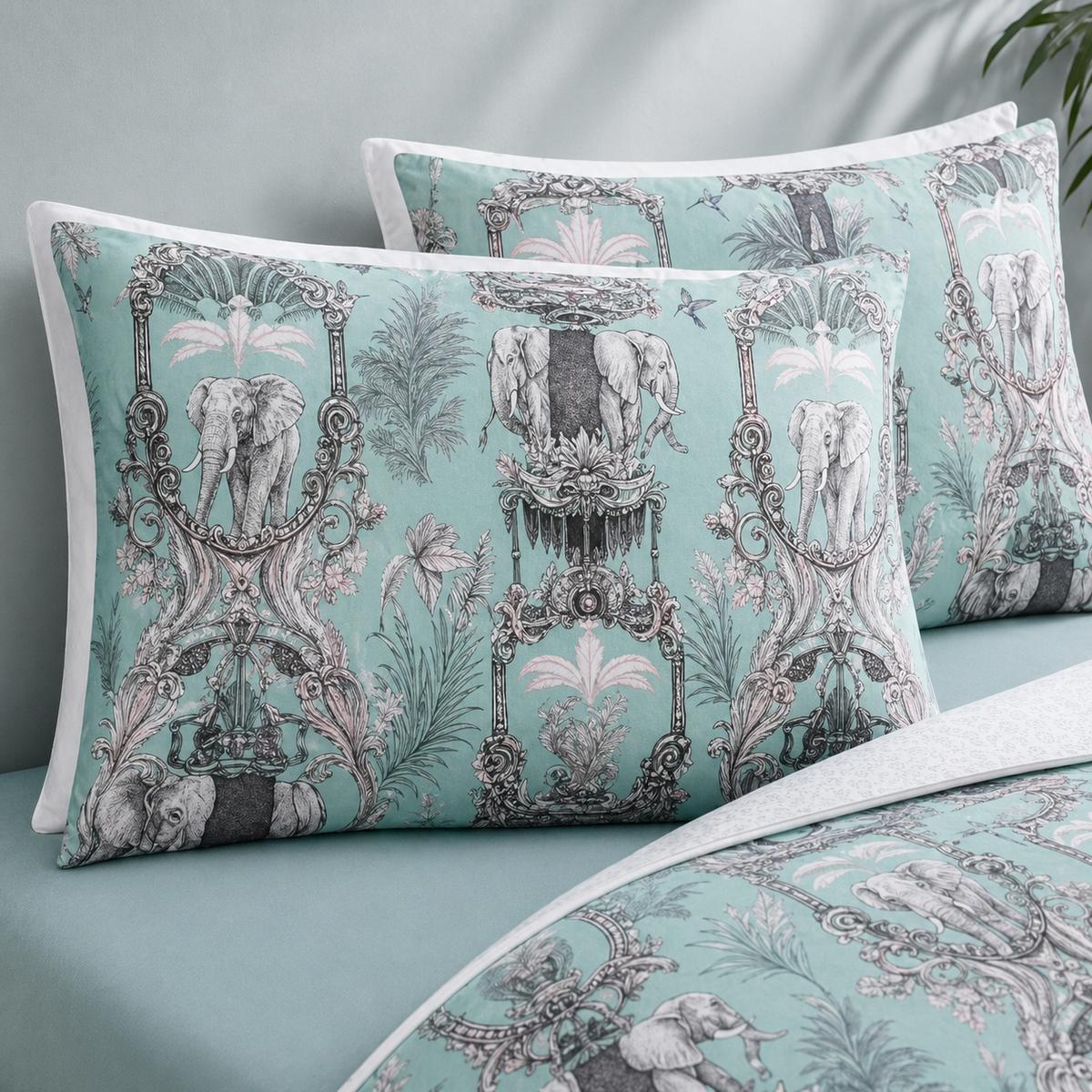Close-up of Animalia duck egg pillowcases showing ornate elephant and jungle panel print