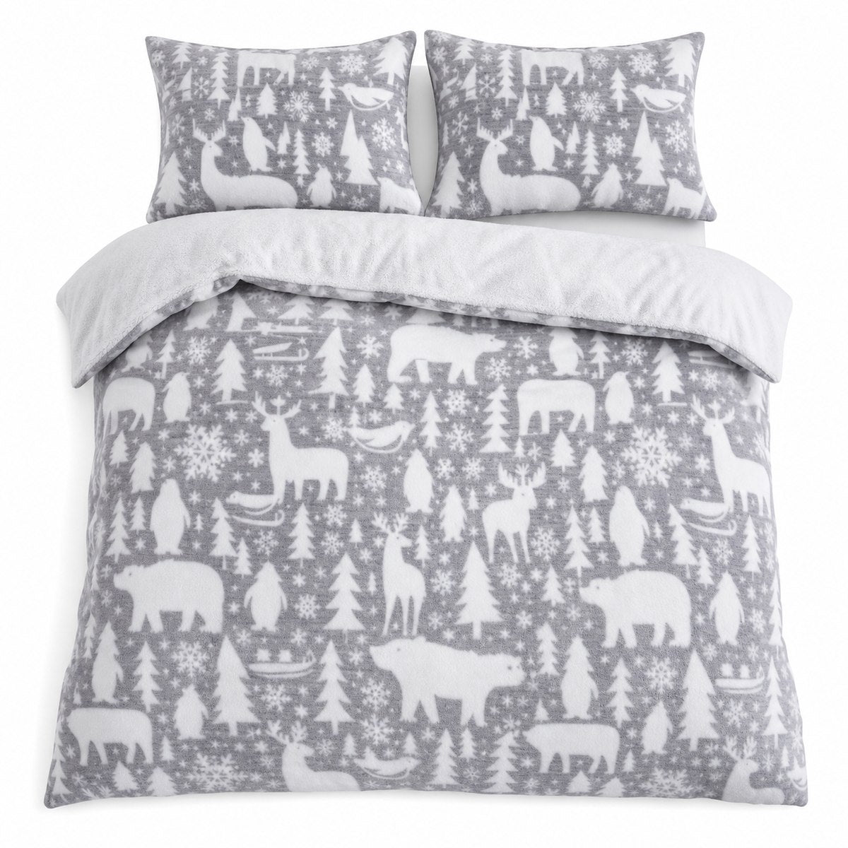 Overhead flat lay of the Arctic Animals Cosy Microfibre Duvet Cover Set with two matching pillowcases