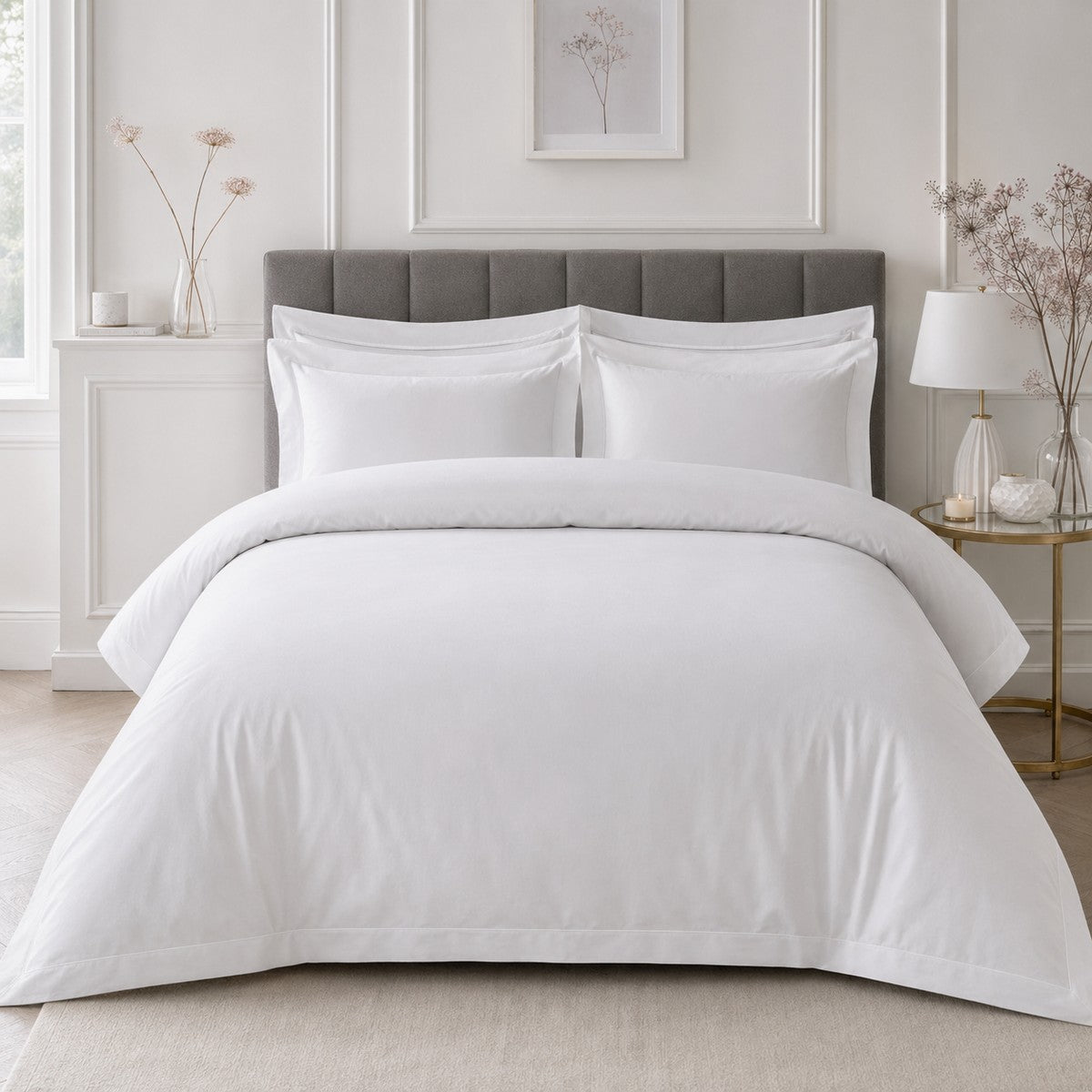 Baratta 100% Cotton White Duvet Cover Set styled on a bed in a coordinated bedroom lifestyle scene