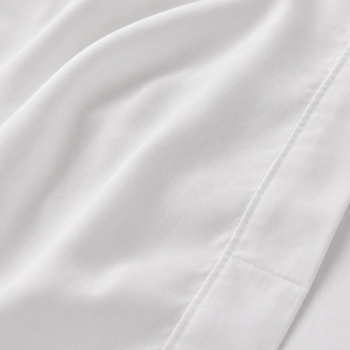 Macro close-up of the cotton fabric on the Baratta 100% Cotton White Duvet Cover Set