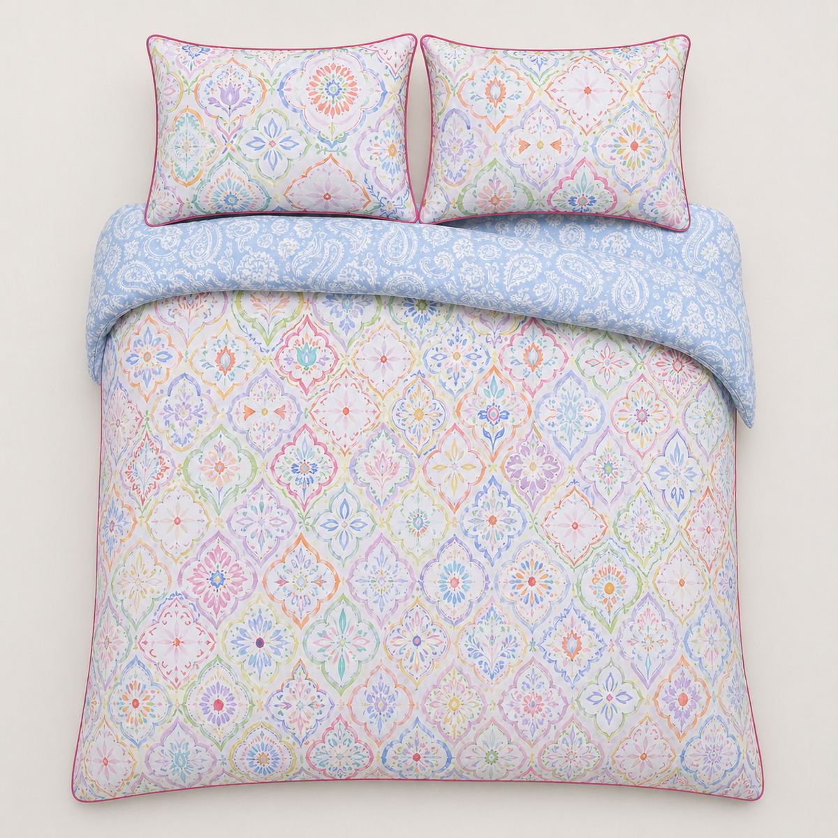 Overhead flat lay of the Casablanca multicolour cotton duvet cover set with two pillows