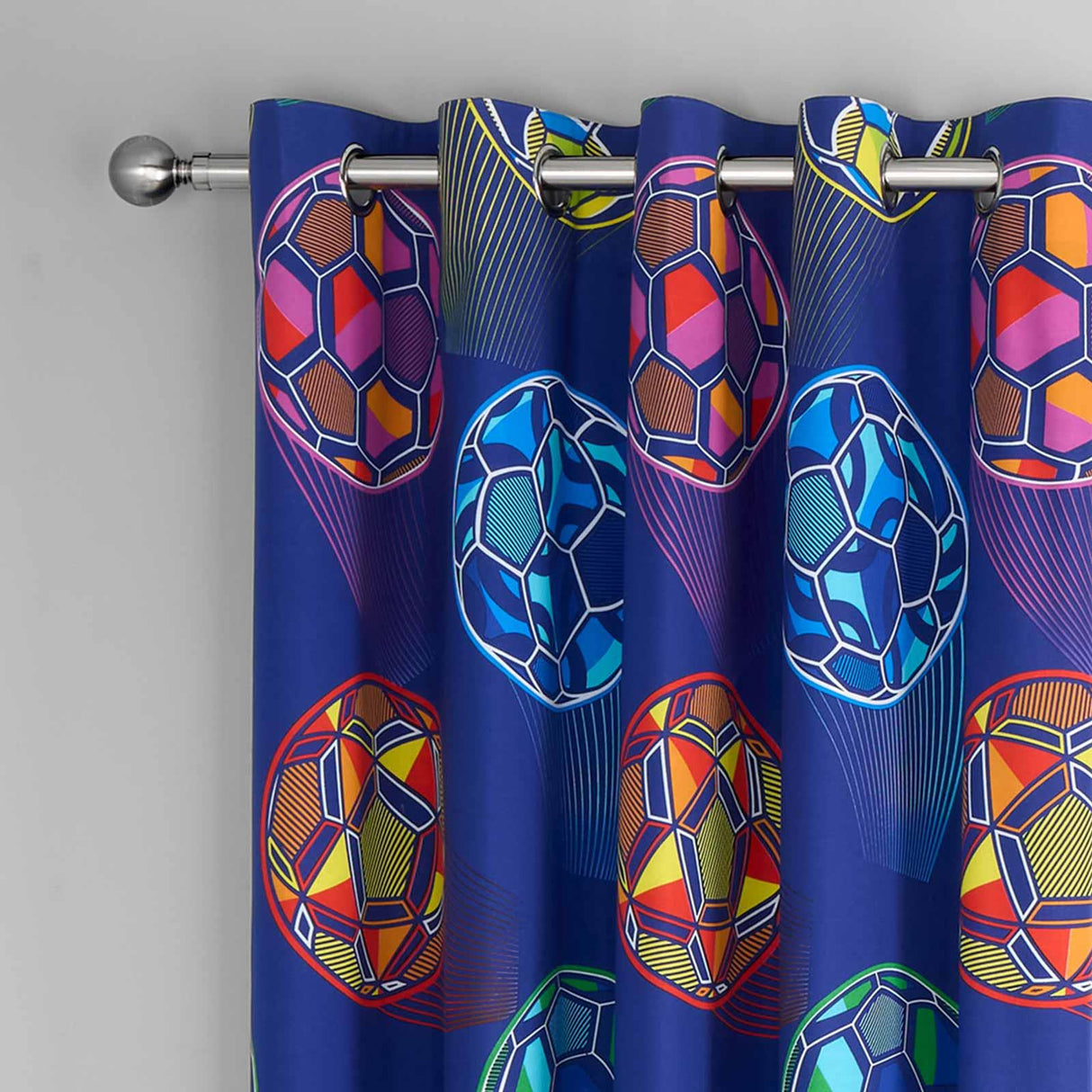 Bright Football Reversible Eyelet Curtains by Catherine Lansfield