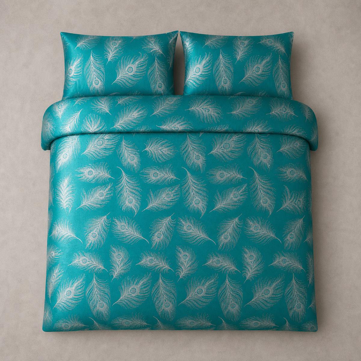 Overhead flat lay of the Dandy Teal jacquard duvet cover set with two matching pillowcases