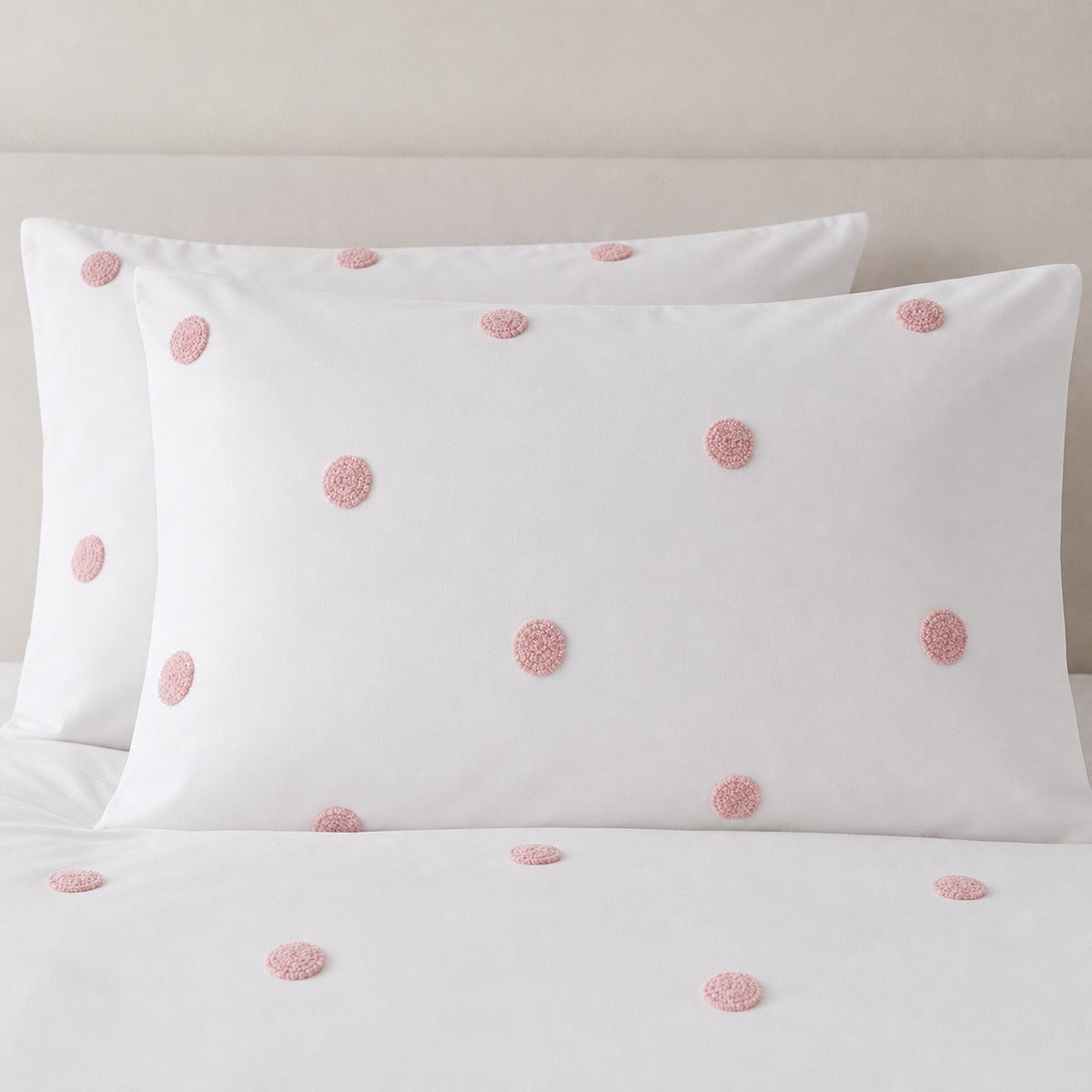 Close-up of Dot Garden Cotton Duvet Cover Set in white + pink pillowcases showing the print and fabric detail