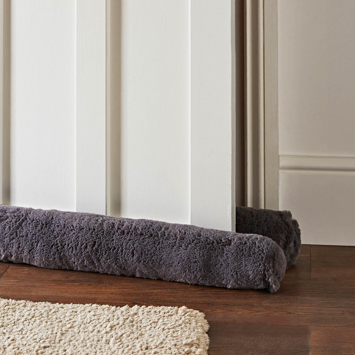 Faux Fur Draught Excluder by Catherine Lansfield