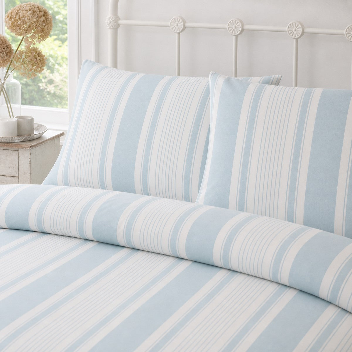 Close-up of Finlay Stripe Polycotton Duvet Cover Set in blue pillowcases showing the print and fabric detail
