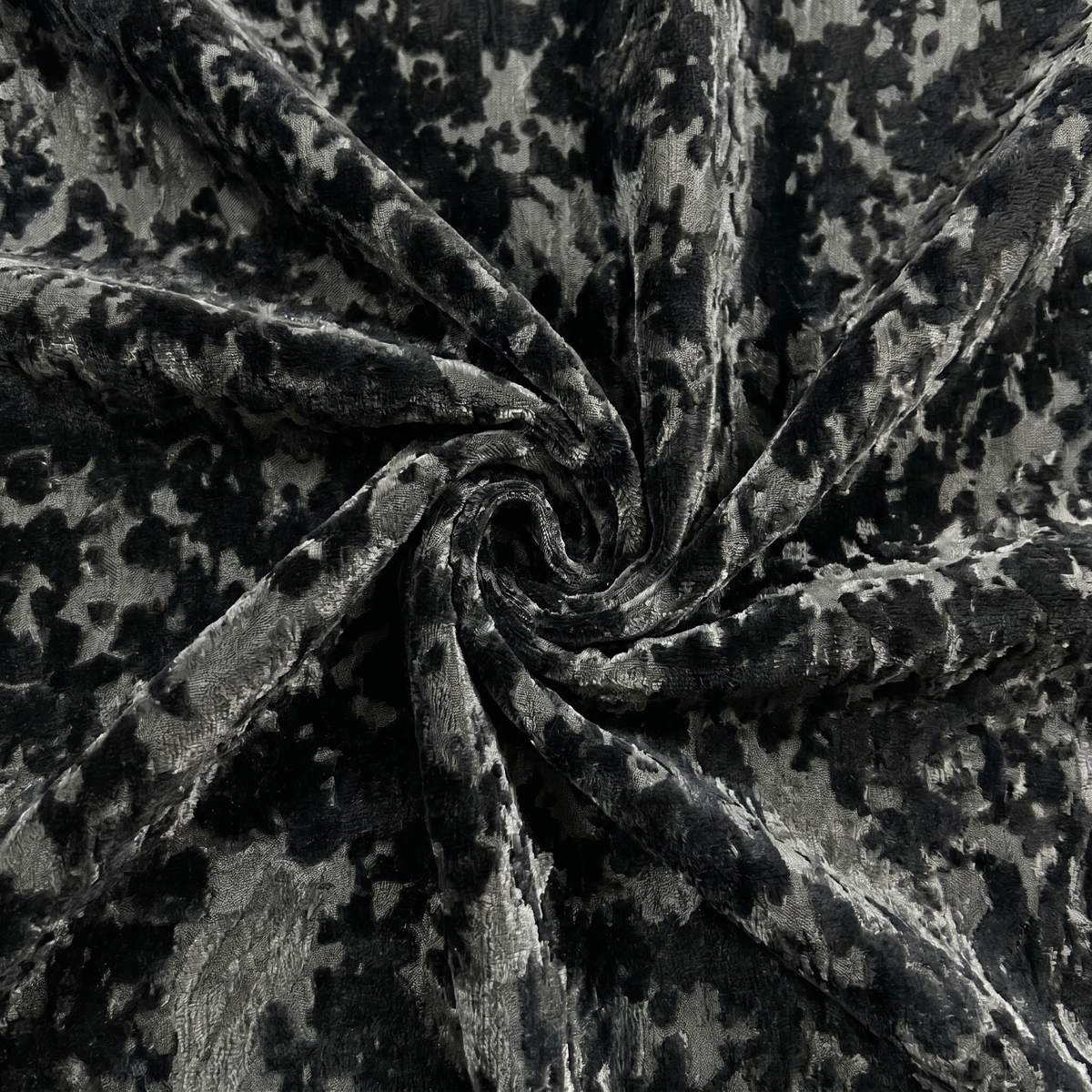 Macro detail of the black Galaxy room darkening curtain fabric texture