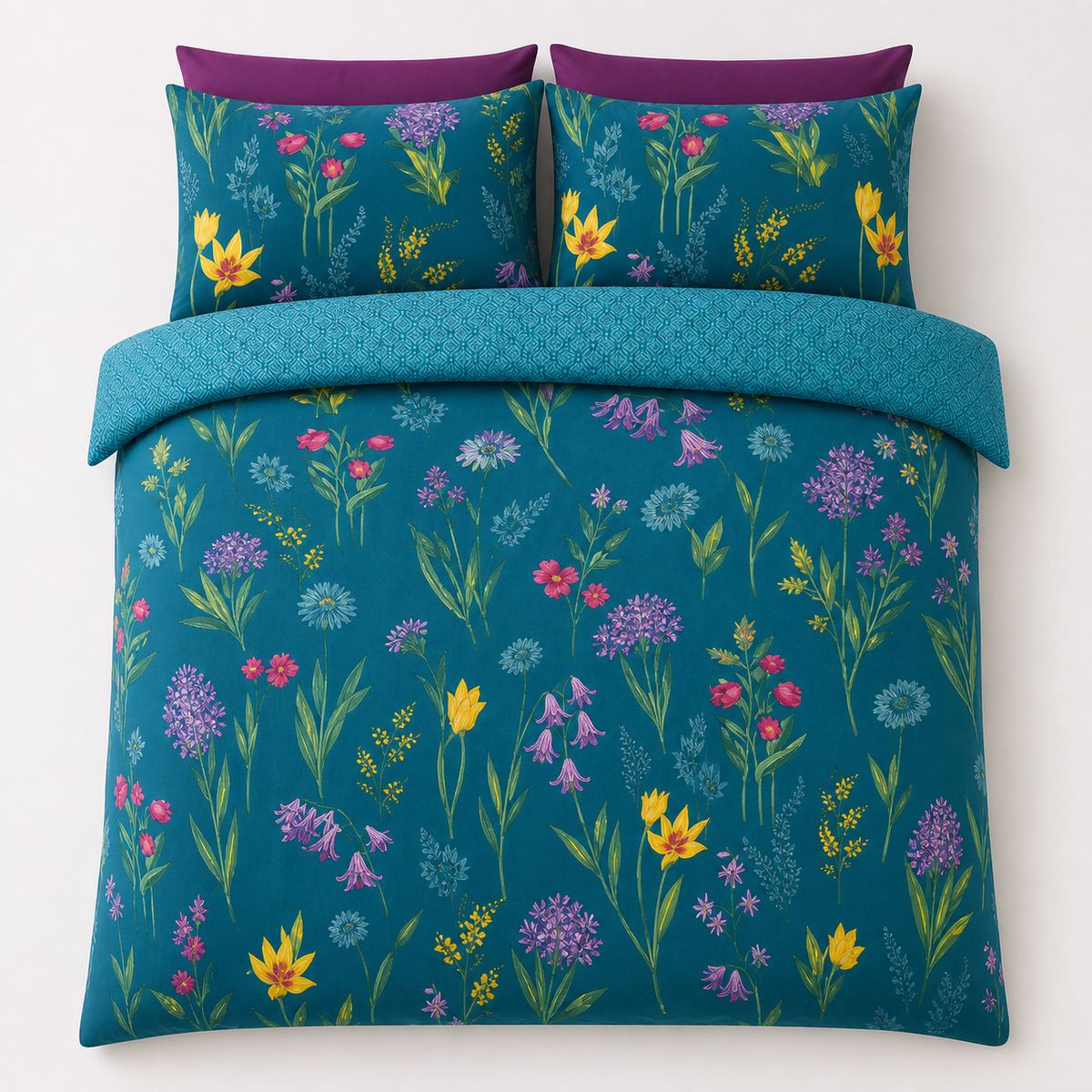 Overhead flat lay of the Ingrid Polycotton Duvet Cover Set in teal with two matching pillowcases