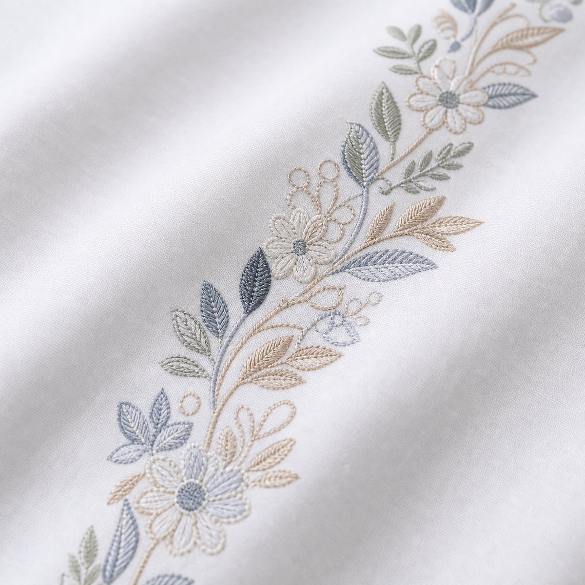 Macro close-up of the white fabric on the Julianna Embroidered 100% Cotton Duvet Cover Set