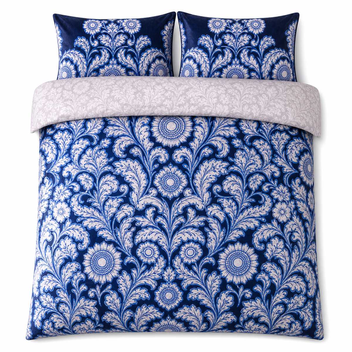 Overhead flat lay of the Laurence Llewelyn-Bowen Romilly Velvet Floral Duvet Cover Set with two matching pillowcases