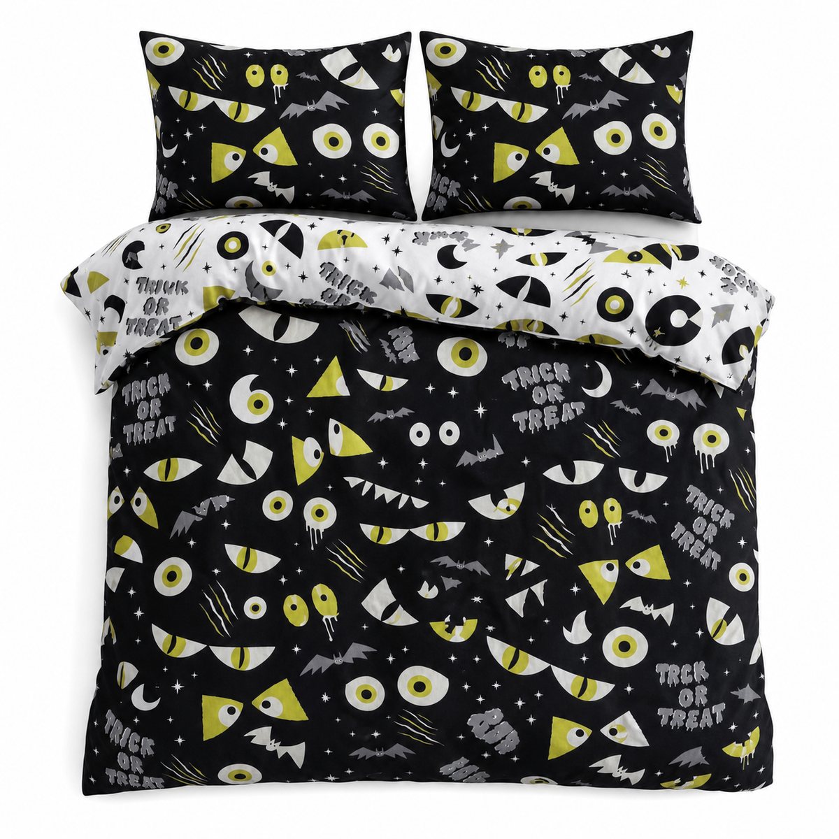 Overhead flat lay of the Trick or Treat Halloween Polycotton Duvet Cover Set with two matching pillowcases
