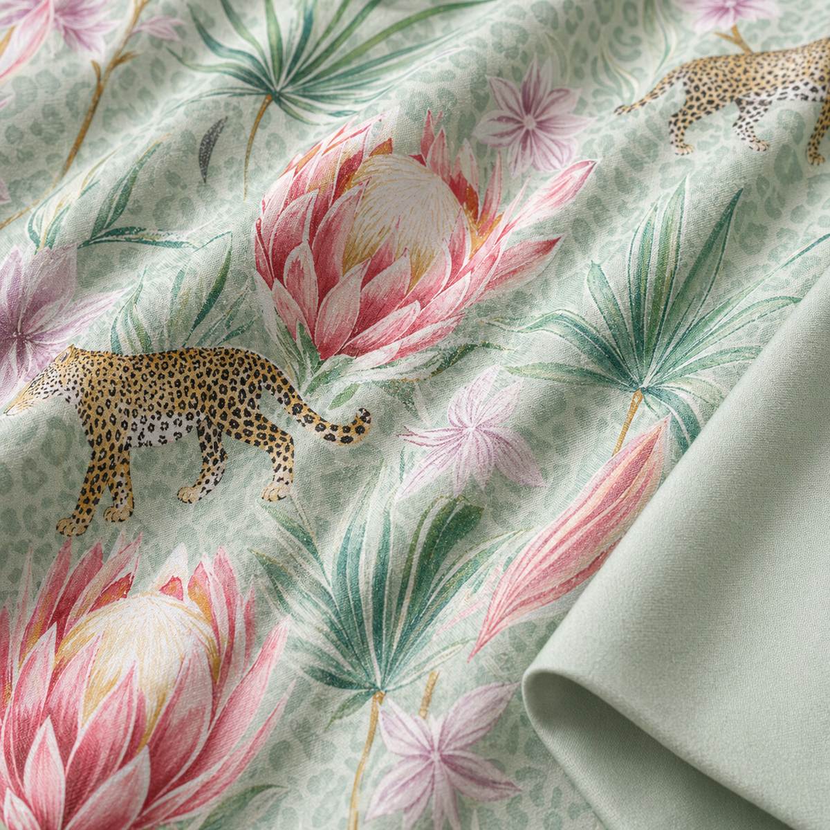 Macro close-up of Tropical Leopard cotton rich duvet fabric with palm leaves flowers and leopard motif