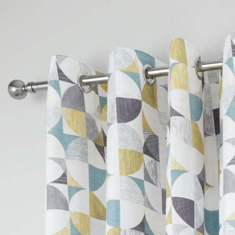 Retro Circles Eyelet Curtains by Catherine Lansfield