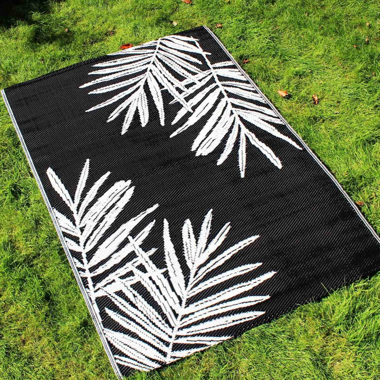 Tahiti Black Leaf Print Outdoor Rug 120cm x 170cm