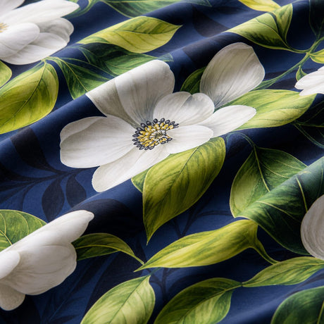 Macro close-up of the cotton fabric on the Alaya 200 Thread Count Cotton Floral Navy Duvet Cover Set