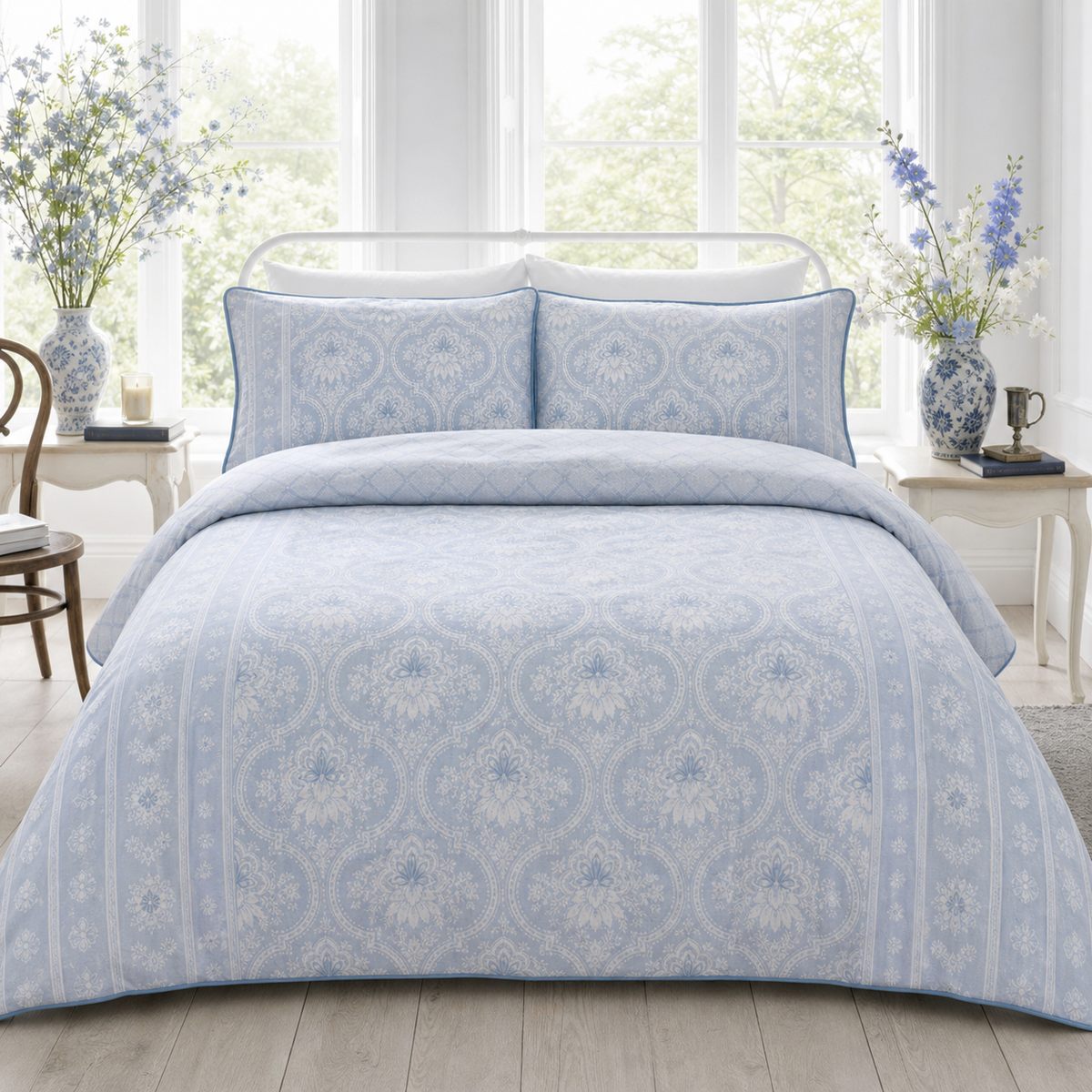 Alexia Blue Floral Cotton Duvet Cover Set styled on a bed in a coordinated bedroom lifestyle scene