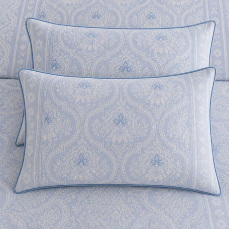 Close-up of matching Alexia Blue Floral Cotton Duvet Cover Set pillowcases showing the pattern and fabric detail
