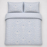 Overhead flat lay of the Alexia Blue Floral Cotton Duvet Cover Set with two matching pillowcases