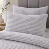 Close-up of matching Altro Seersucker Microfibre Duvet Cover Set pillowcases showing the pattern and fabric detail