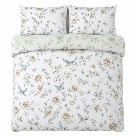 Overhead flat lay of the Amelle Green reversible duvet cover set with the sage reverse folded over