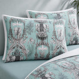 Close-up of Animalia duck egg pillowcases showing ornate elephant and jungle panel print