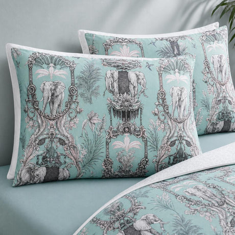 Close-up of Animalia duck egg pillowcases showing ornate elephant and jungle panel print