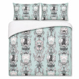 Overhead flat lay of the Animalia duck egg elephant duvet cover set with two pillows