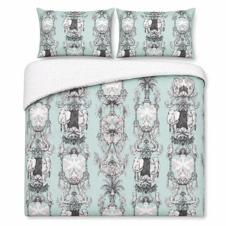 Overhead flat lay of the Animalia duck egg elephant duvet cover set with two pillows