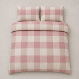 Overhead flat lay of the Ashford Check Cosy Flannelette Duvet Cover Set in natural with two matching pillowcases
