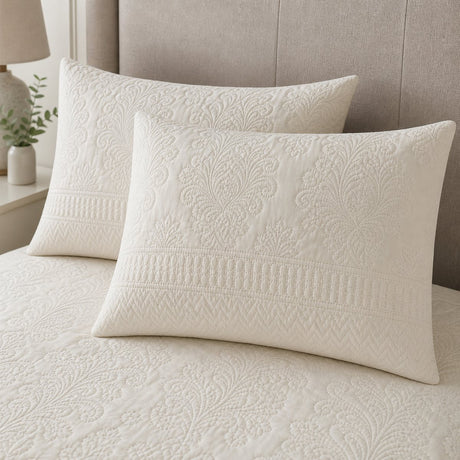 Close-up of Avery Stripe Natural pillowcases showing the raised floral and stripe texture