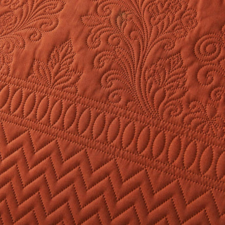 Macro close-up of the terracotta Avery Stripe microfibre raised floral texture