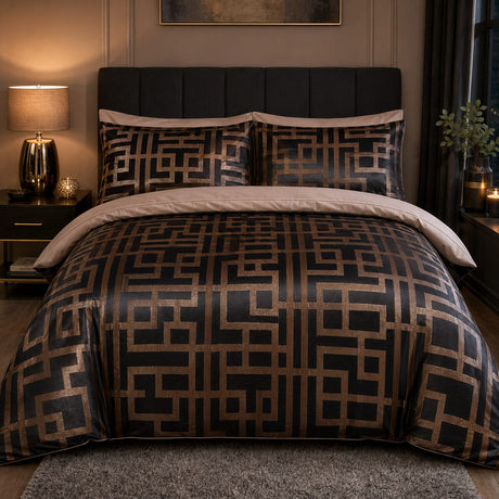 Bardon charcoal and bronze Greek key jacquard duvet cover set styled in a warm bedroom