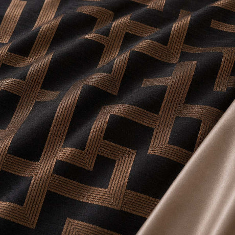 Macro close-up of Bardon microfibre jacquard fabric with raised bronze maze pattern