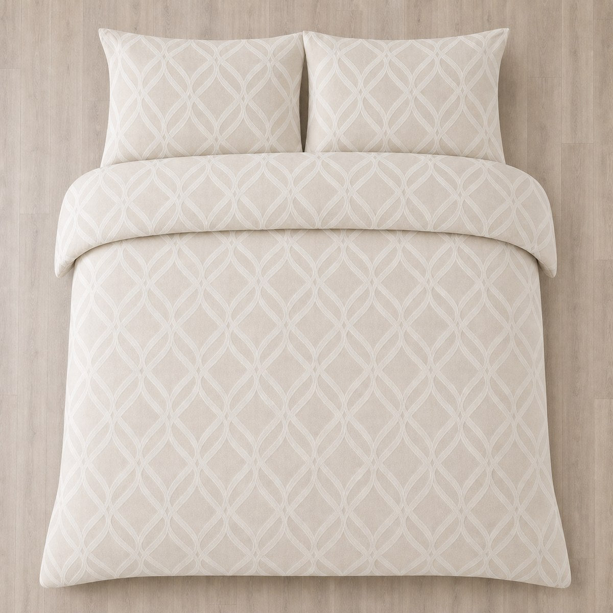 Overhead flat lay of the Belfort Soft Microfibre Duvet Cover Set in champagne with two matching pillowcases